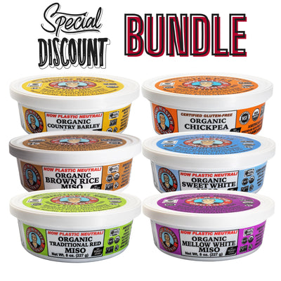 Organic Miso paste variety pack showing six 8 ounce tubs of every variety of Miso Master miso; barley miso, brown rice miso, mellow white miso, sweet white miso and soy free chickpea miso